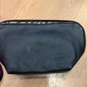 Kusshi leather cosmetic case with extra liner
